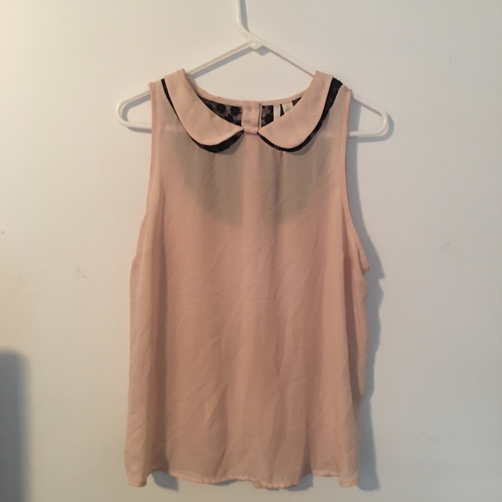 Collared pink blouse with black lace